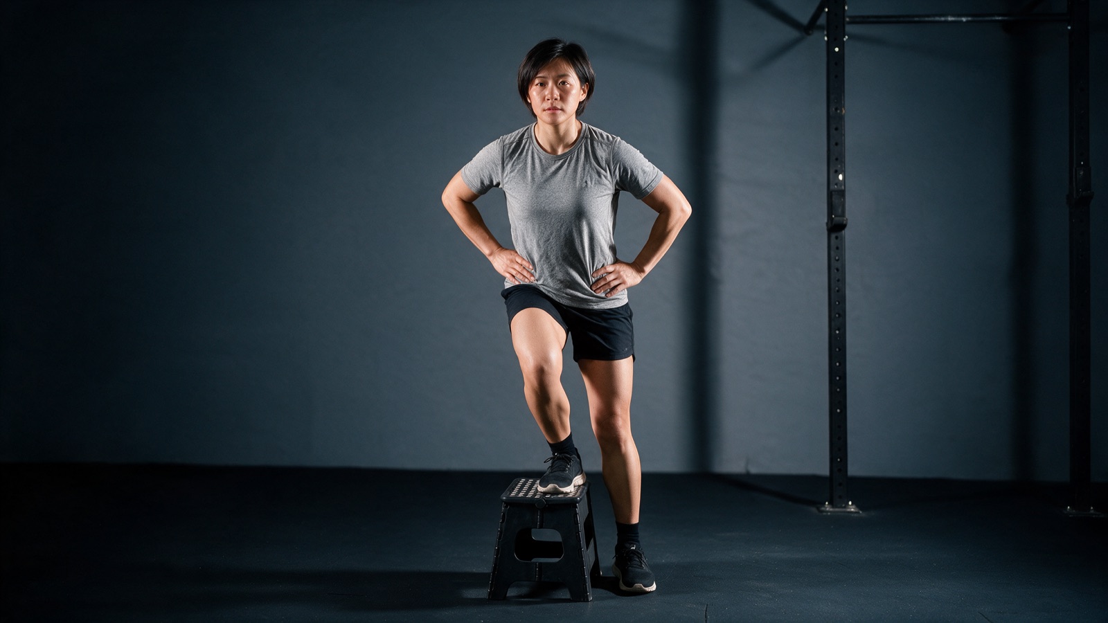 Lowering one foot from a low step with control